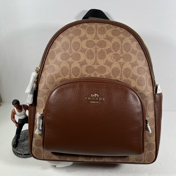 coach backpack tan and brown Tabby with Quilting Honey One Size : Clothing, Shoes & Jewelry Signature coated canvas Inside zip cell phone and multifunction pockets Laptop compartment with zip closure Zip closure recycled polyester lining Top handle with 2 drop Outside zip pockets Adjustable shoulder straps Fits a 12 (zip compartment) or 13 (main compartment) laptop 10 3/4 (L) x 14 (H) x 5 1/4 (W) Style No. Coach Brown/Tan Signature Mini Backpack